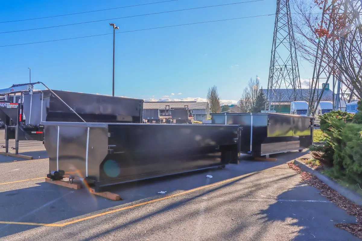 Roll-off dumpster ready for waste disposal at job site for Demolition Dumpster Rental in Princeton